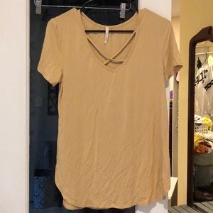 gold top with crossed straps